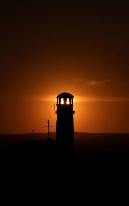 Radiant Lighthouse Sunset