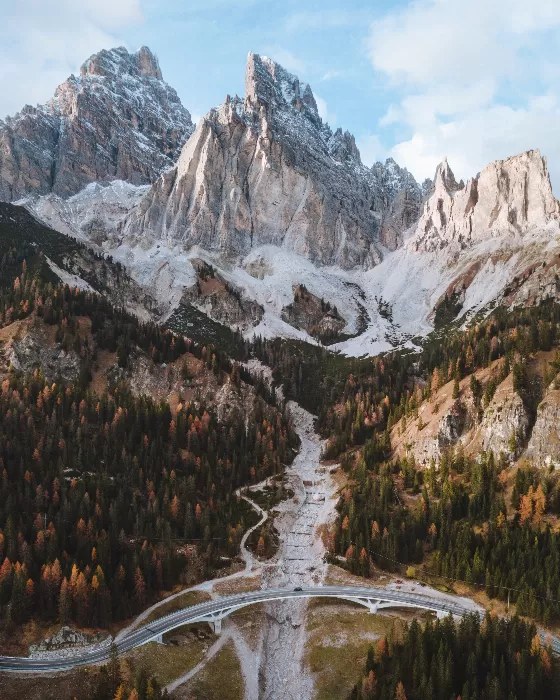 Autumnal forest and the beautiful Italian Dolomites
