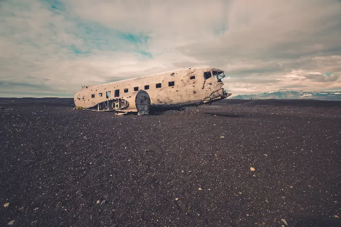 Old passenger airplane wreck on the beach in Iceland